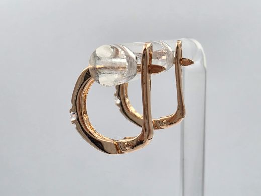Gold earrings with zircon