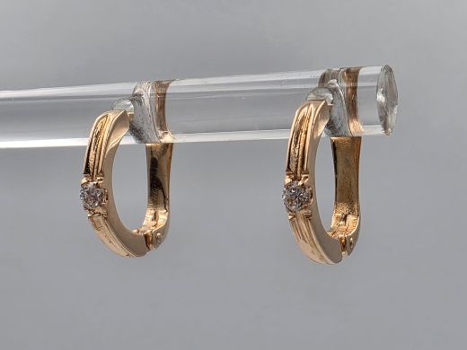 Gold earrings with zircon