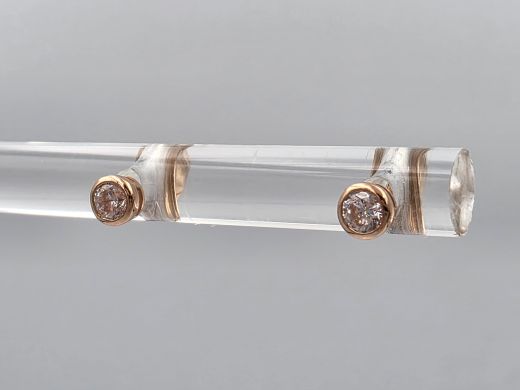 Gold earrings with zircon, 0.33 g