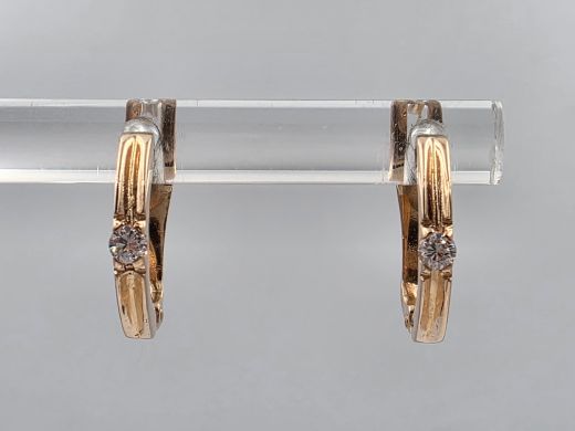 Gold earrings with zircon