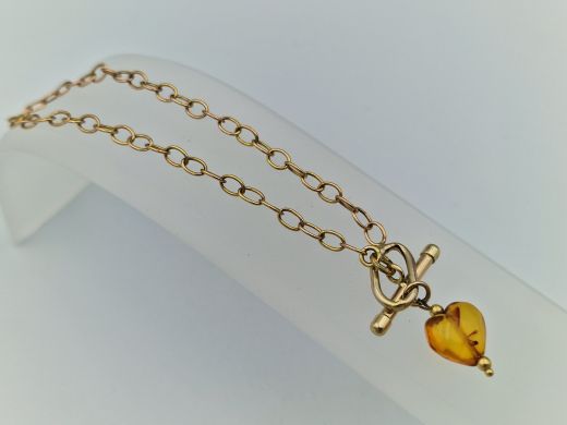 Zelta rokassprādze ar dzintaru, 1.92 g, izm. 18