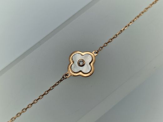 Zelta rokassprādze ar peridotu un pērle un cirkoniju un perlamutru, 1.14 g, izm. 19