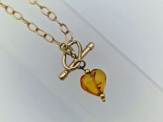 Zelta rokassprādze ar dzintaru, 1.92 g, izm. 18