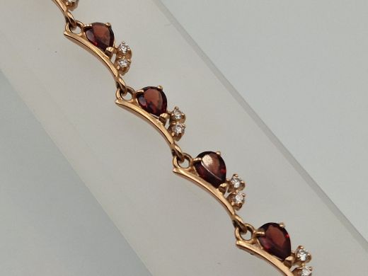Zelta rokassprādze ar granātu un cirkoniju, 13.8 g, izm. 17.5