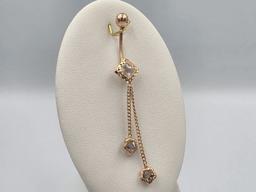 Gold piercing with zircon