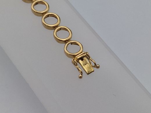 Zelta rokassprādze ar briljantu un topāzu, 11.22 g, izm. 18