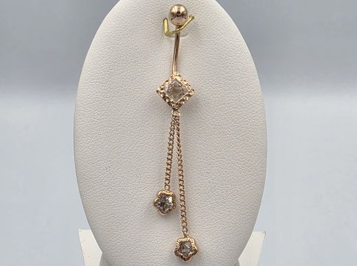 Gold piercing with zircon