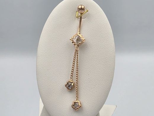 Gold piercing with zircon