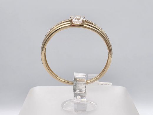 Gold ring with zircon