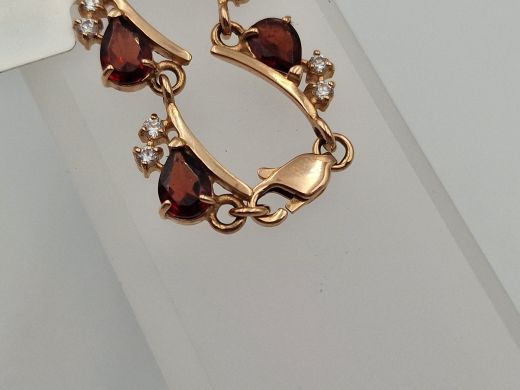 Zelta rokassprādze ar granātu un cirkoniju, 13.8 g, izm. 17.5