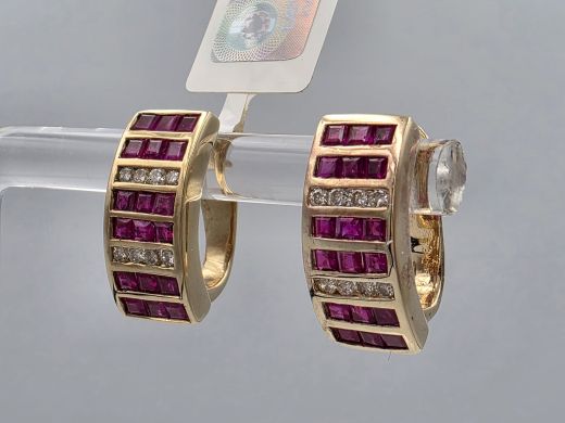 Gold earrings with diamonds and rubies