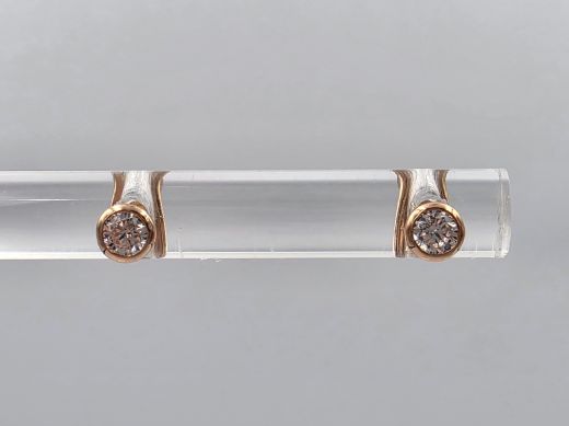 Gold earrings with zircon, 0.33 g